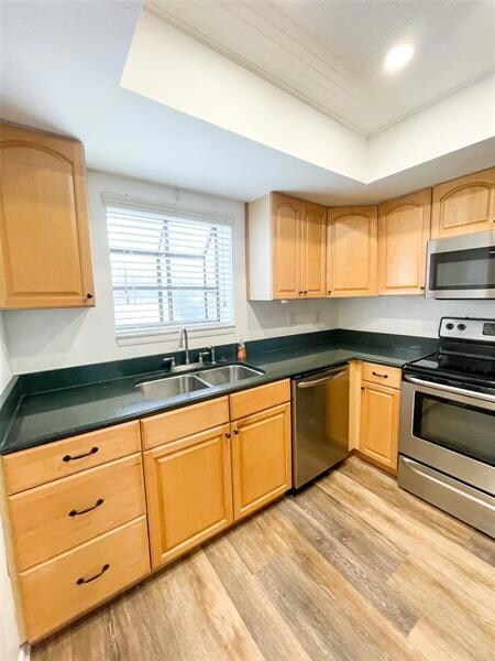 Kitchen features plenty of cabinets for storage of all your meal prep needs. 
