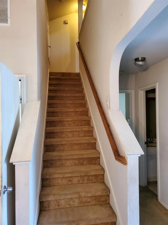 Stairs lead to Secondary Bedrooms & Loft