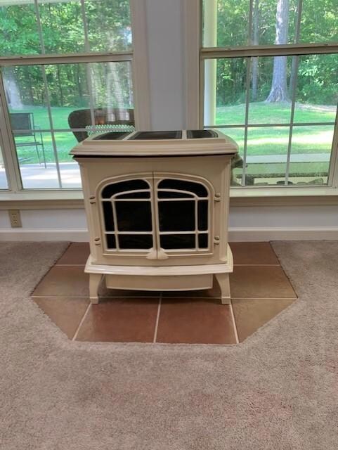 cute fireplace/stove in great room