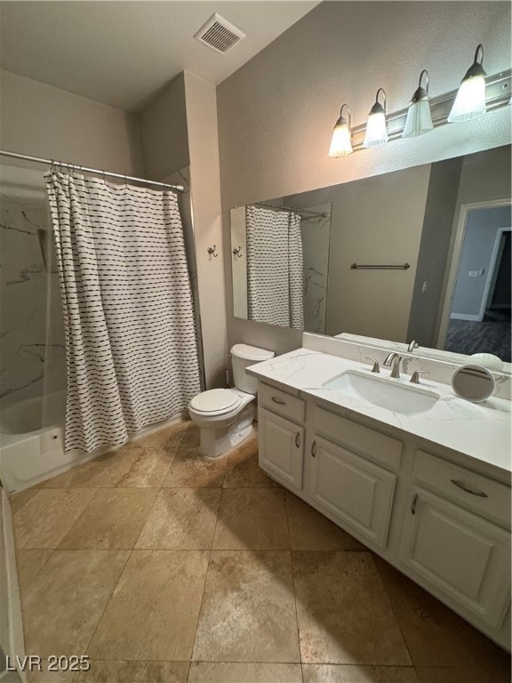 Full bath featuring toilet, vanity, shower / bath