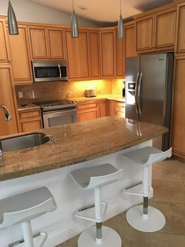 Granite Countertops & Designer Lighting