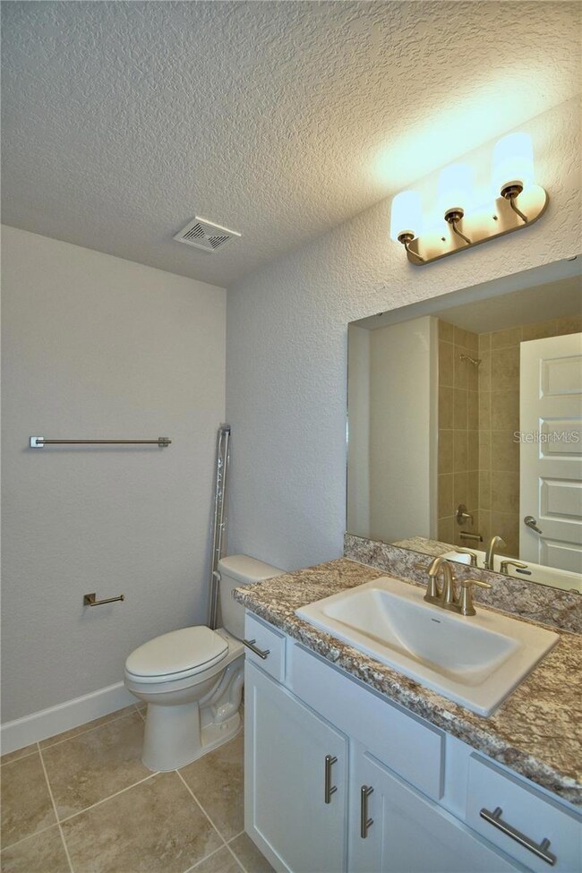 1734 Carnostie Rd, Winter Haven, FL 33884 - photo 3