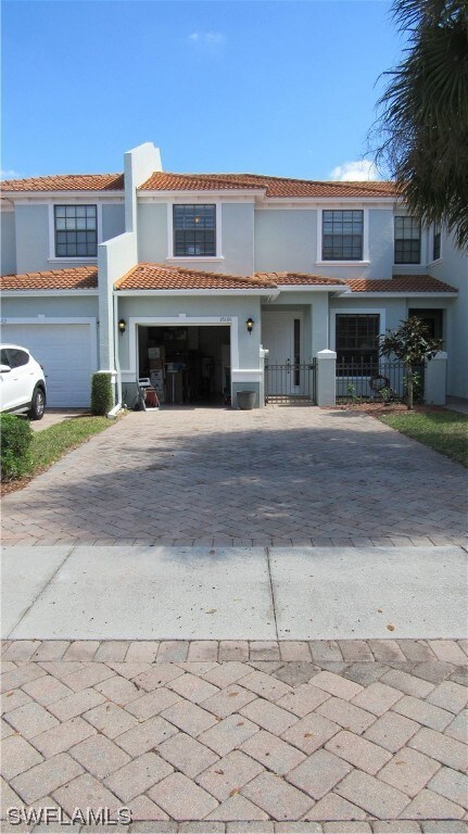 Double wide driveway. Holds 4 Cars.