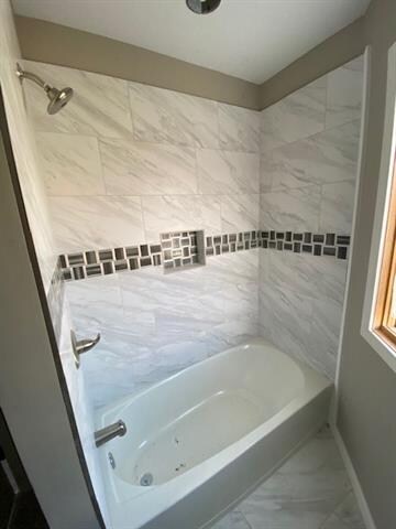 Full bath on second level of turret.