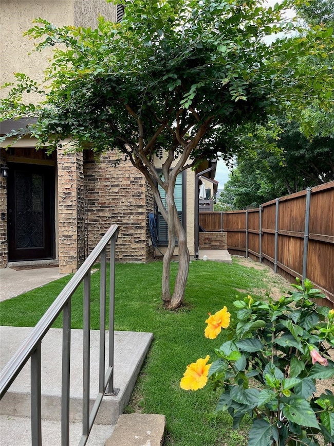 View of fenced backyard