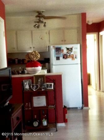 Kitchen opens to living room