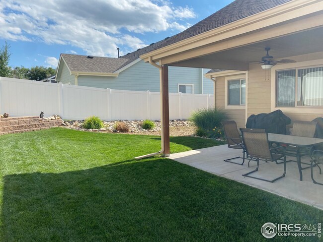 Covered patio complete with 2 fans