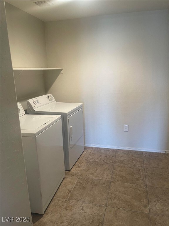 Laundry area featuring independent washer and drye