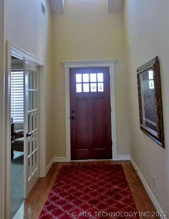 A grand entry to the home with the first bedroom t