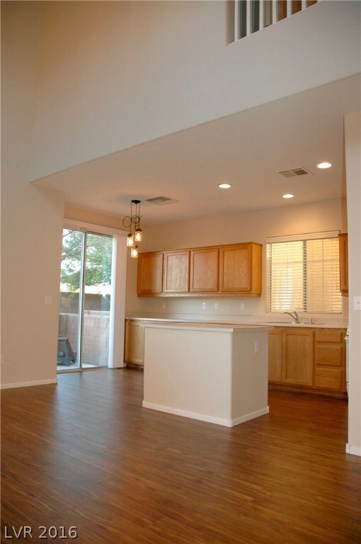 View from great room into kitchen.  Kitchen has is
