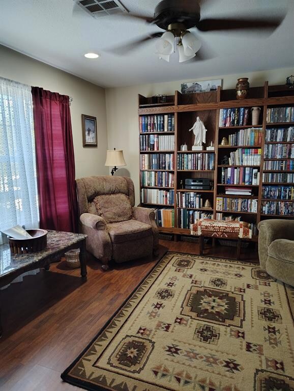 Sitting room featuring hardwood / wood-style floor