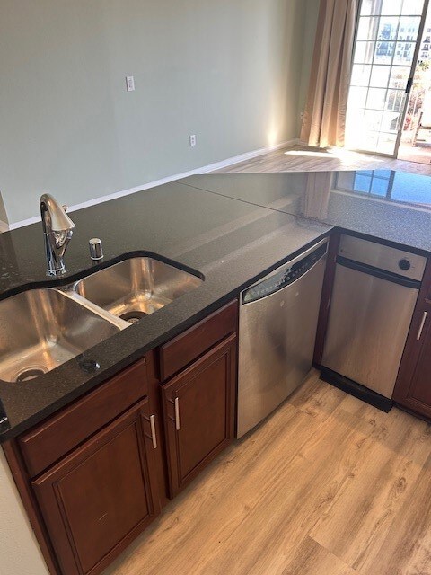 Large counterspace with dishwasher and trash compactor.