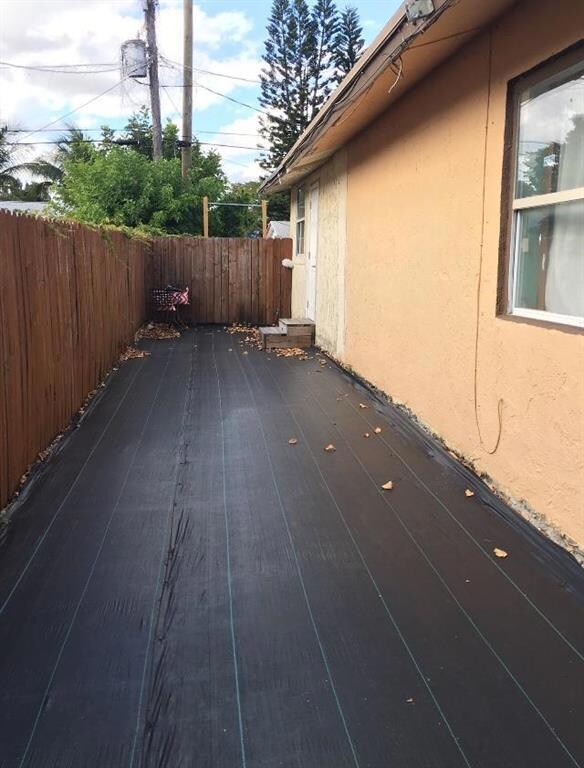 Covered Patio by Entrance of Home