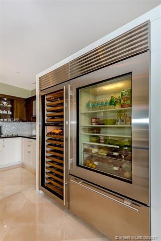 Built-in Sub Zero Glass Doors Refrigerator and Win