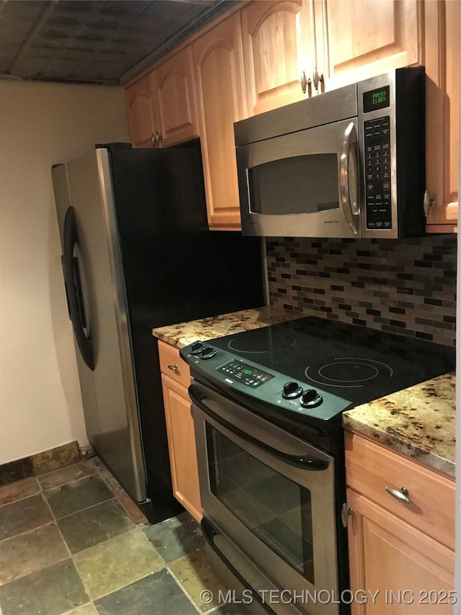 Kitchen with stainless steel appliances