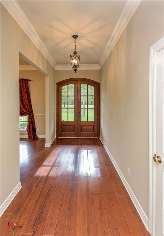 Entry with gleaming hardwood flooring!
