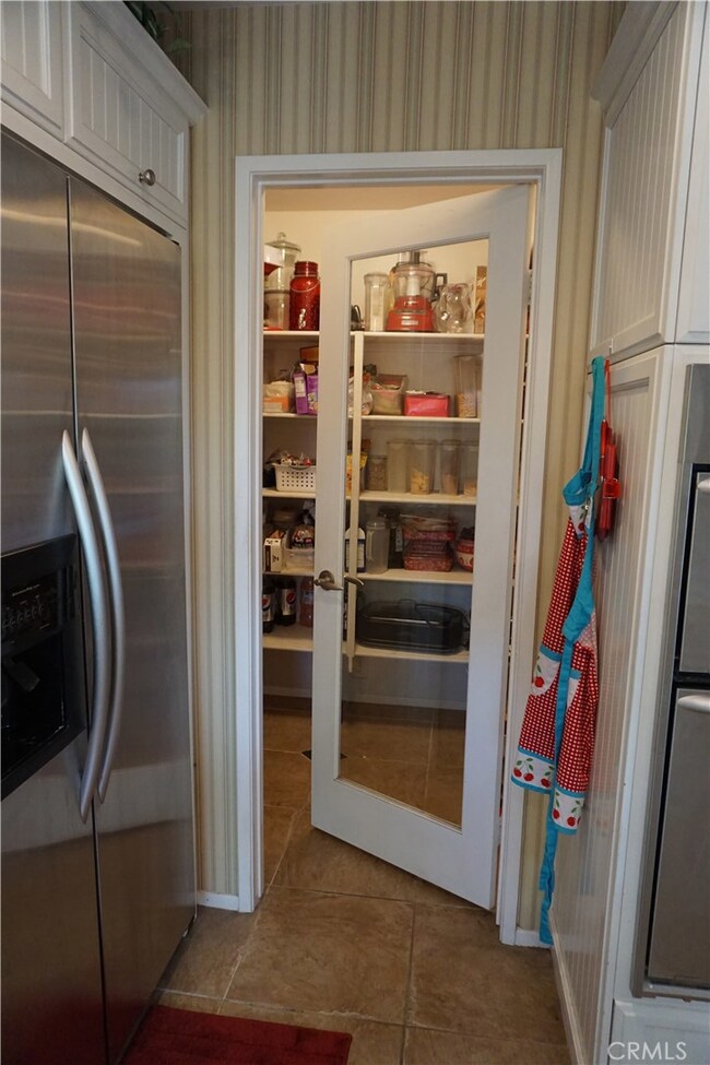 Walk in Kitchen Pantry with Glass Panel Door