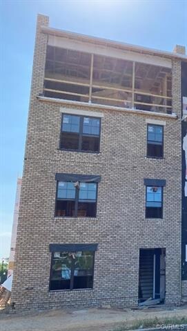 Exterior of one of the first 2-level stacked condo