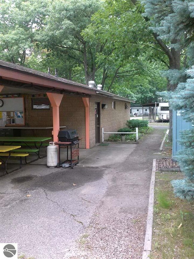 Directly across from trailer