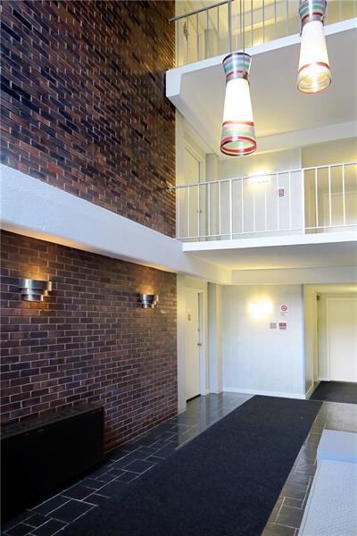 Building foyer with elevator.