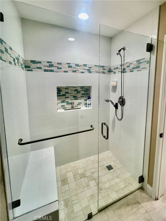 Walk in shower with no step and bench!