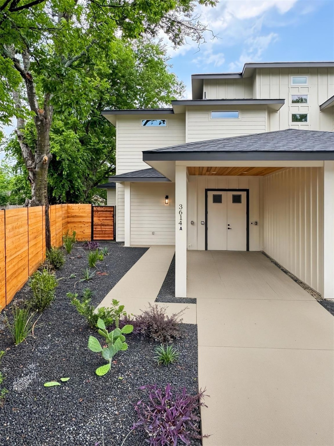 View of front of home with board and batten sidin