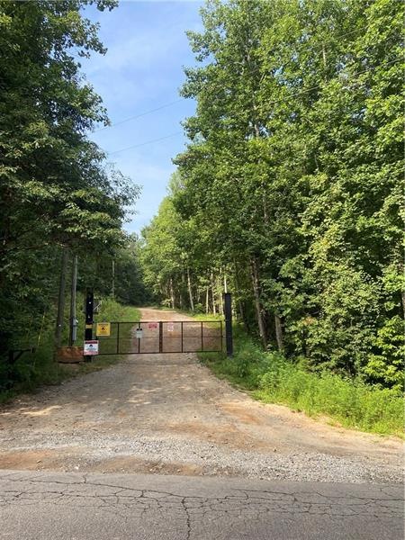 Security gate at entrance to easement leading to p