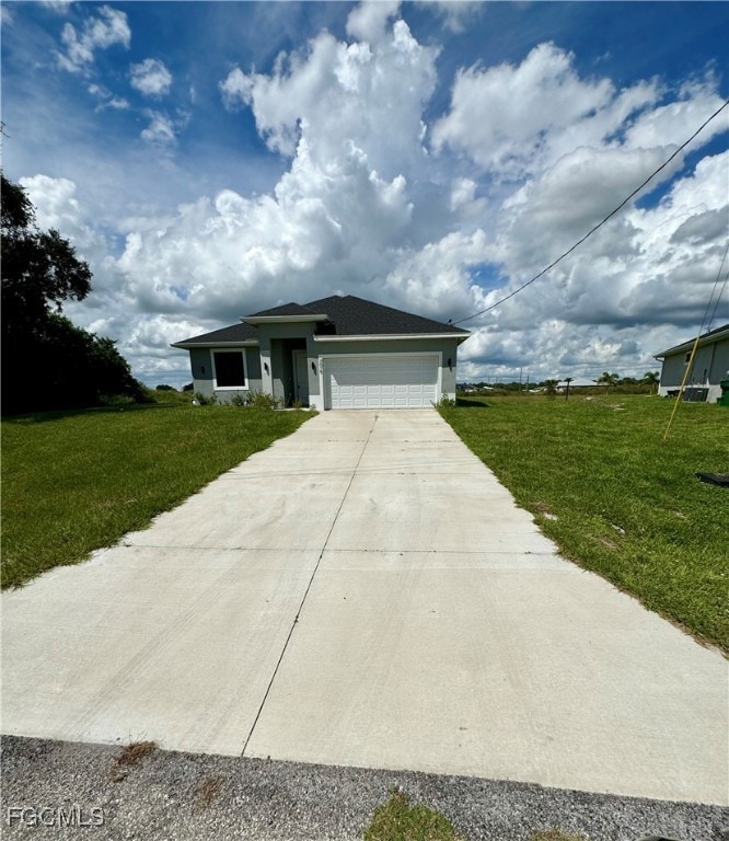 Single story home featuring an attached garage, driveway, stucco siding, and a front lawn