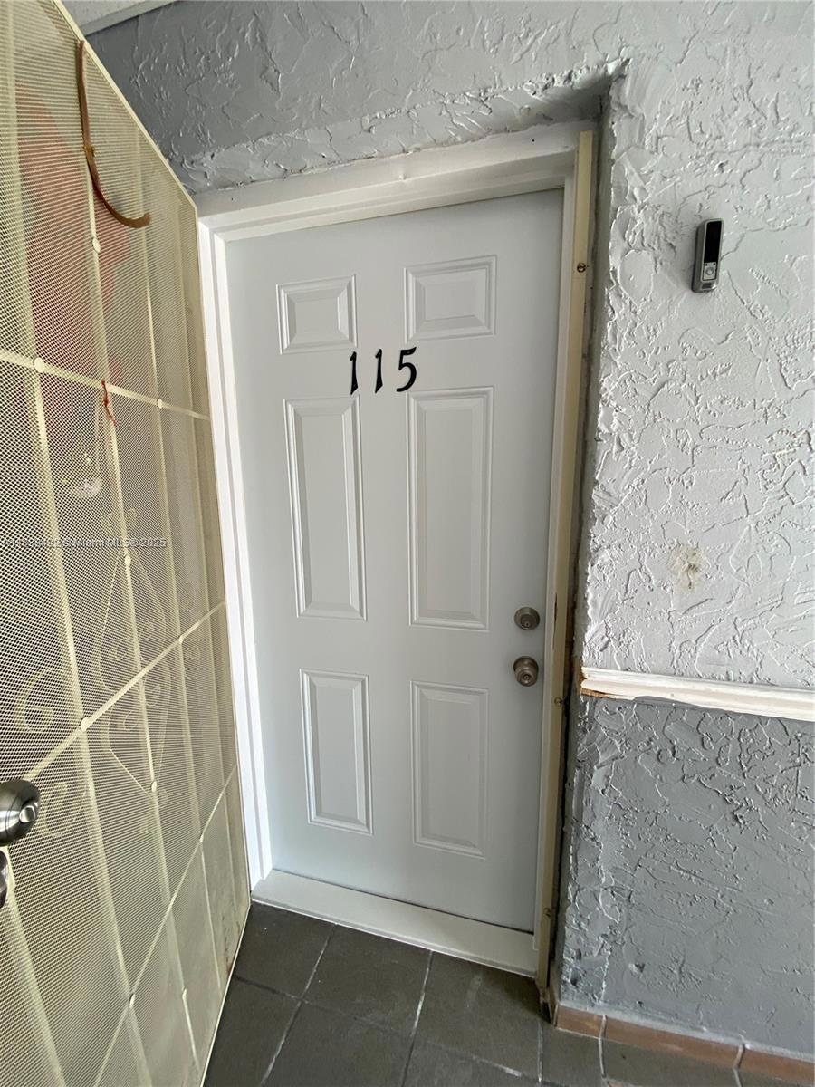 Westland Gardens unit 115, Hialeah, FL 33012 - photo 1