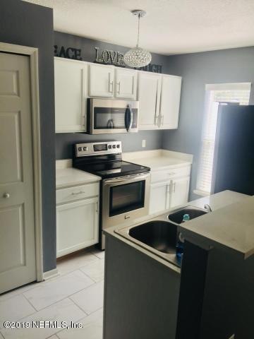 9043 S Libby Rd, Jacksonville, FL 32211 - photo 1