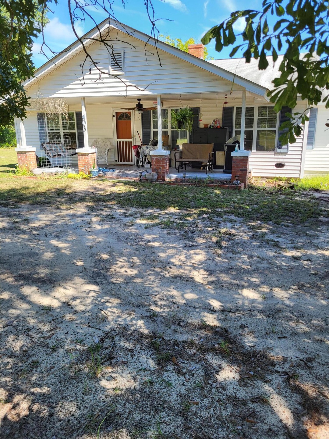 deep front porch and shady front yard!