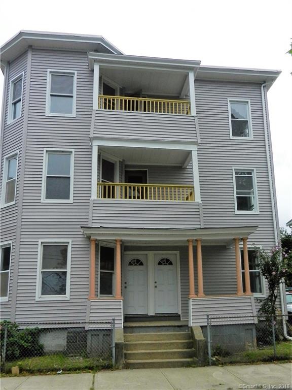 REALLY NICE THREE FAMILY WITH LARGE APPARTMENTS ON