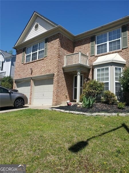 Brick front two story traditional on cul de sac st