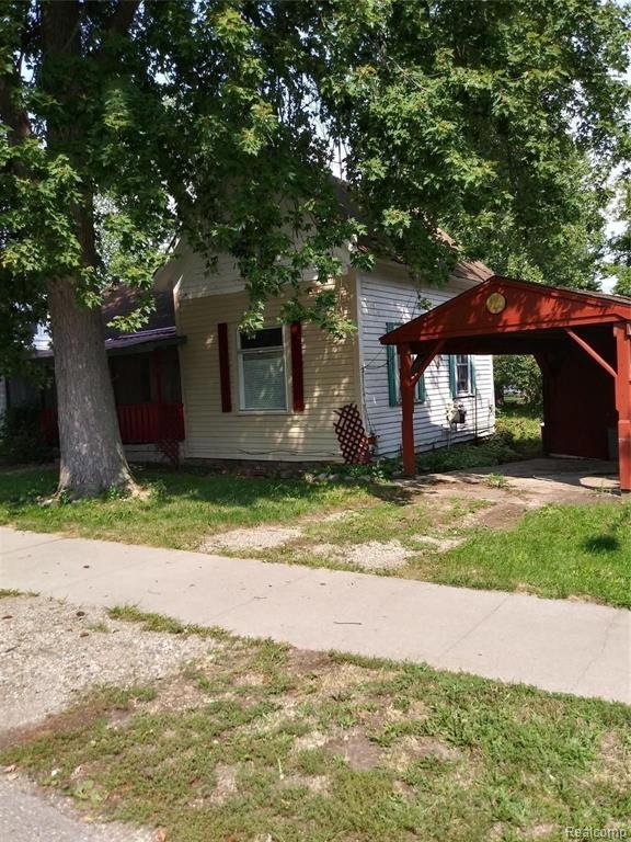 outside front view with carport
