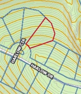 Lot is in red.  Currently there is a home sitting on the lot to the right but not the two on the left.