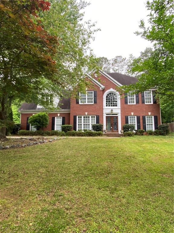 5770 Orouke Rd, Sugar Hill, GA 30518 - photo 1