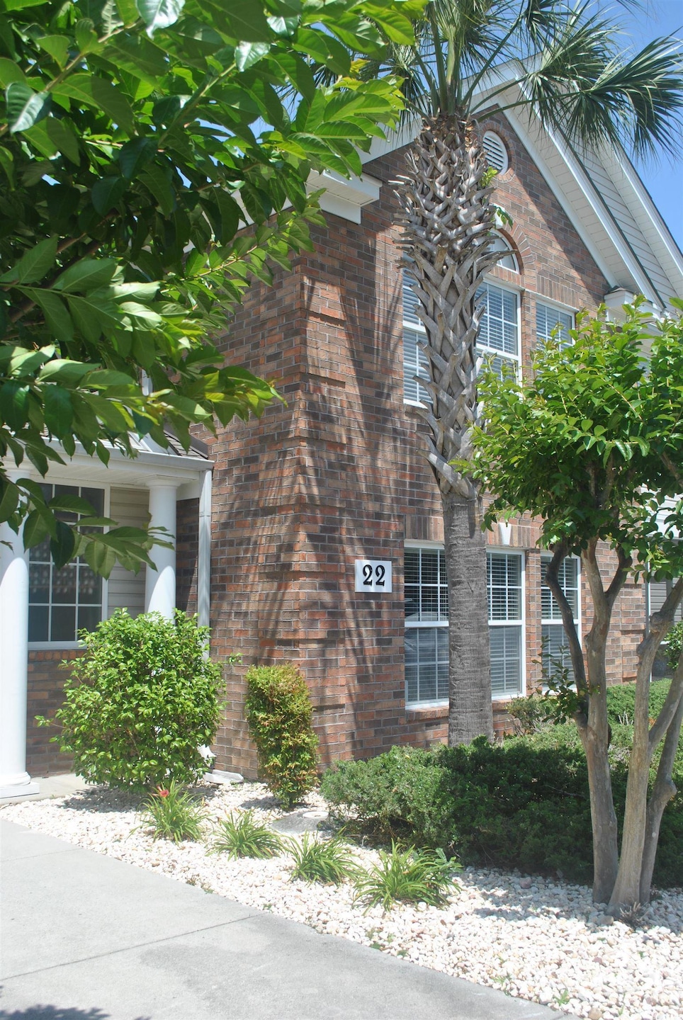 View of home's exterior with brick siding