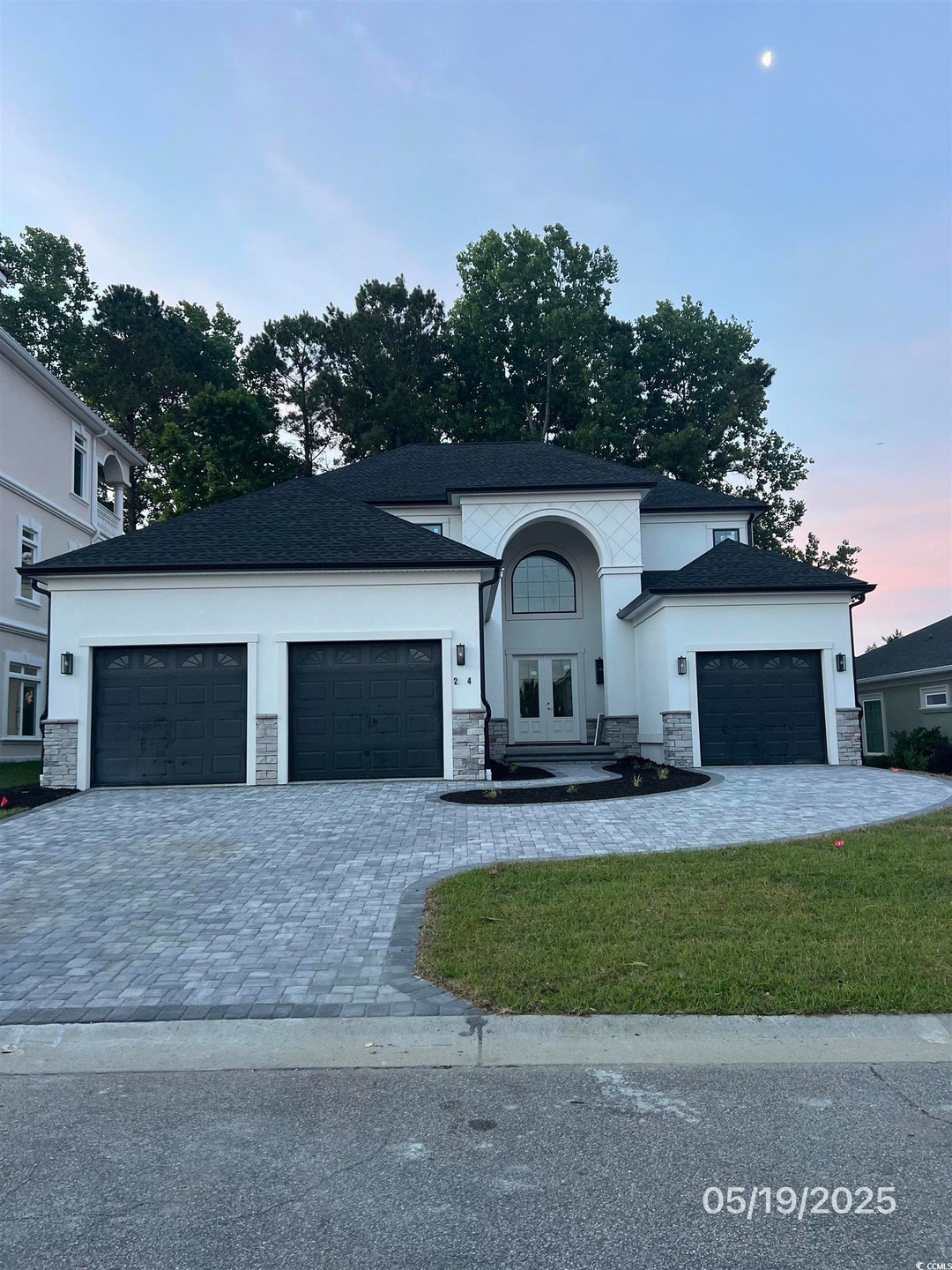 View of front of home with stone siding, french do