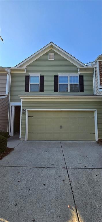 View of front facade with a garage