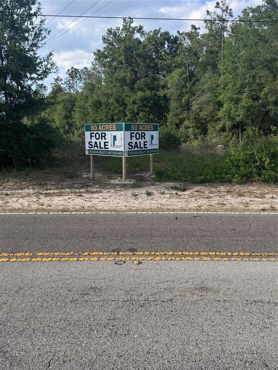 Sign facing Kelly Park Rd