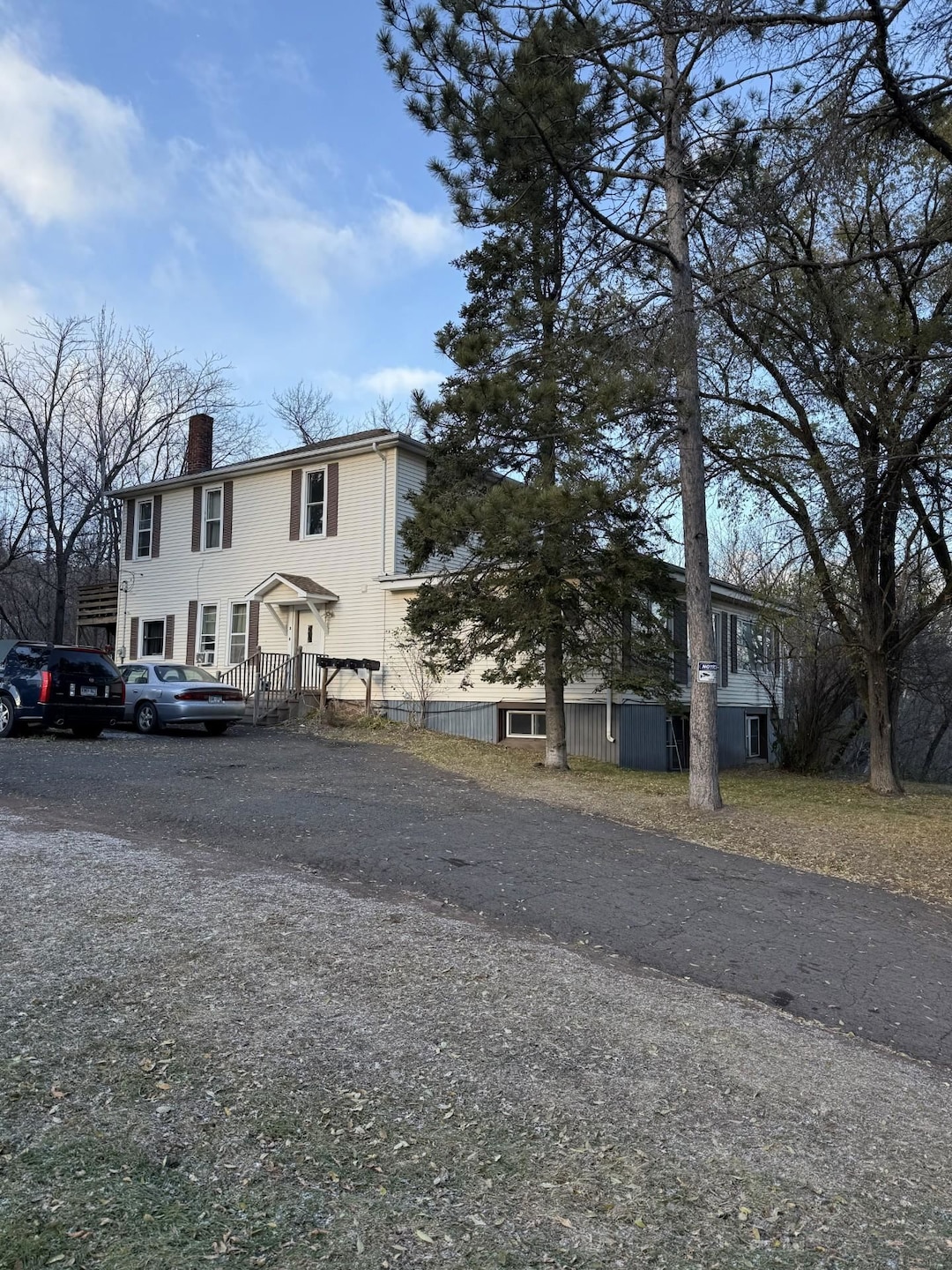 View of front of property with a chimney