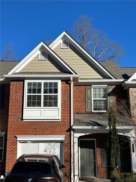 View of front facade with a garage