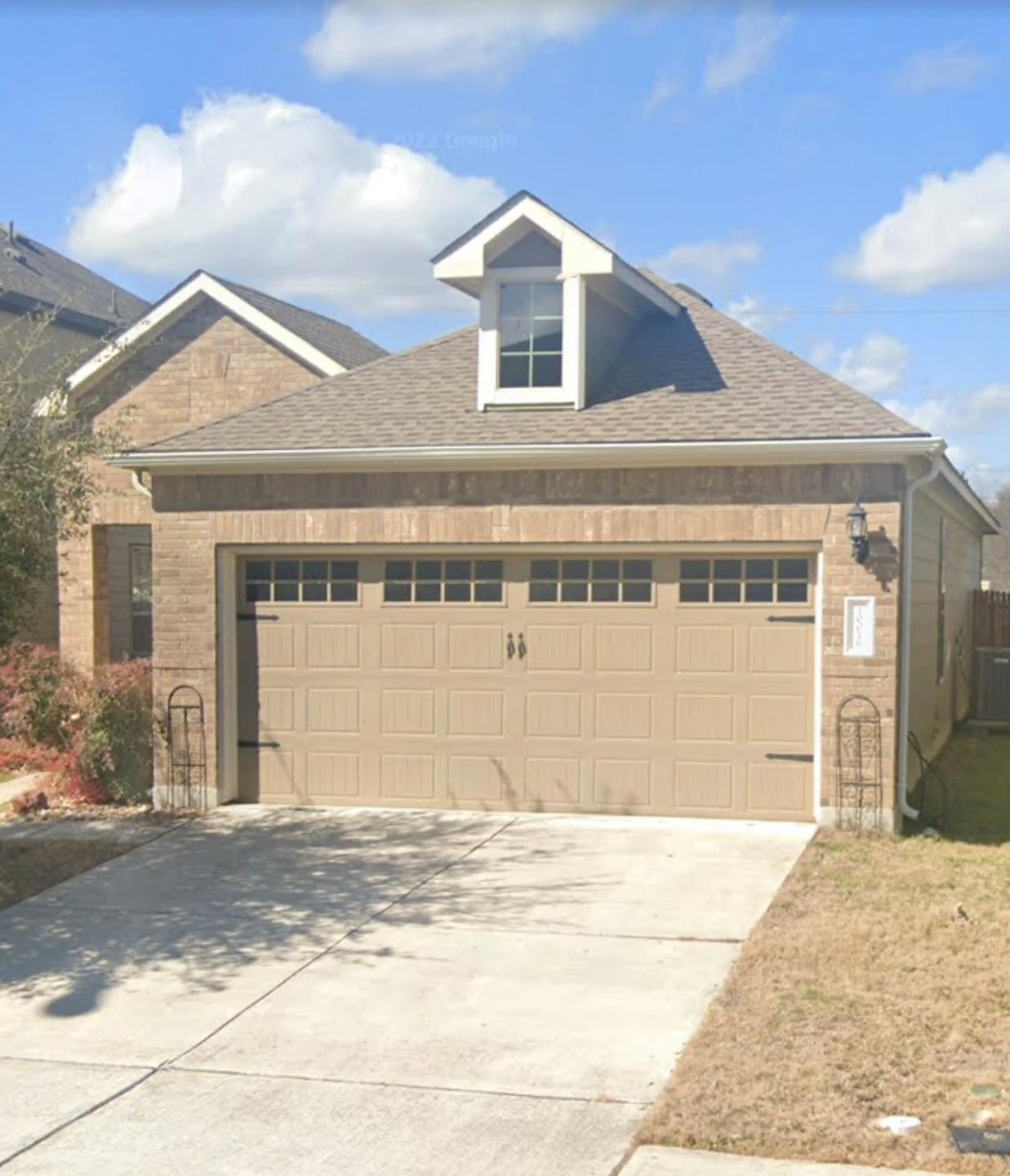 View of front of house featuring an attached gara