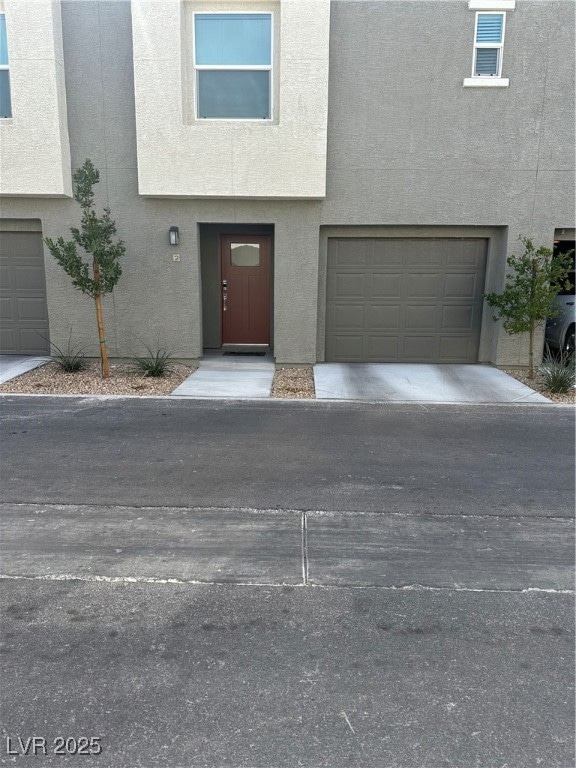 View of front of property featuring stucco siding