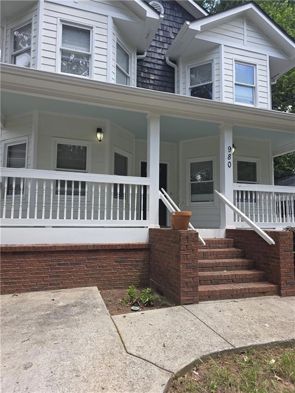 View of front of property with a porch