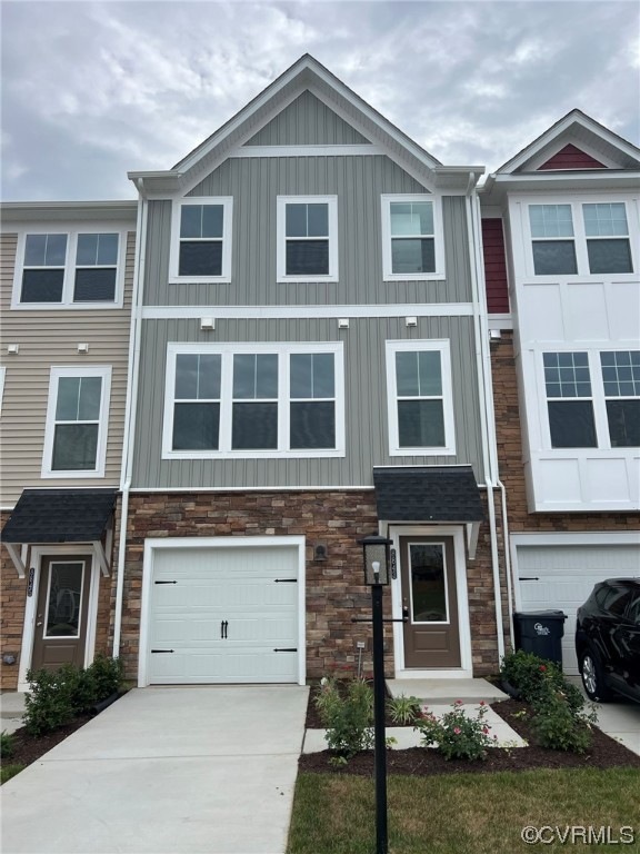 View of property with garage