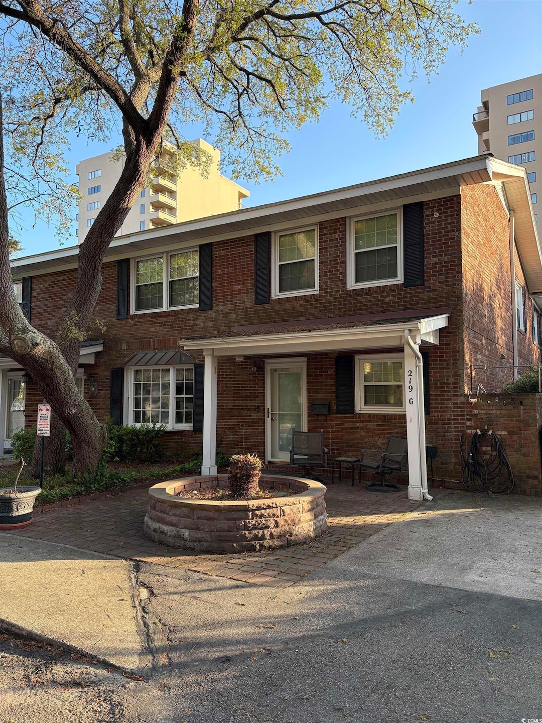 Multi unit property featuring brick siding
