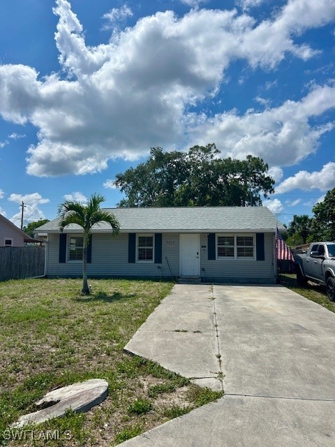 Single story home featuring driveway