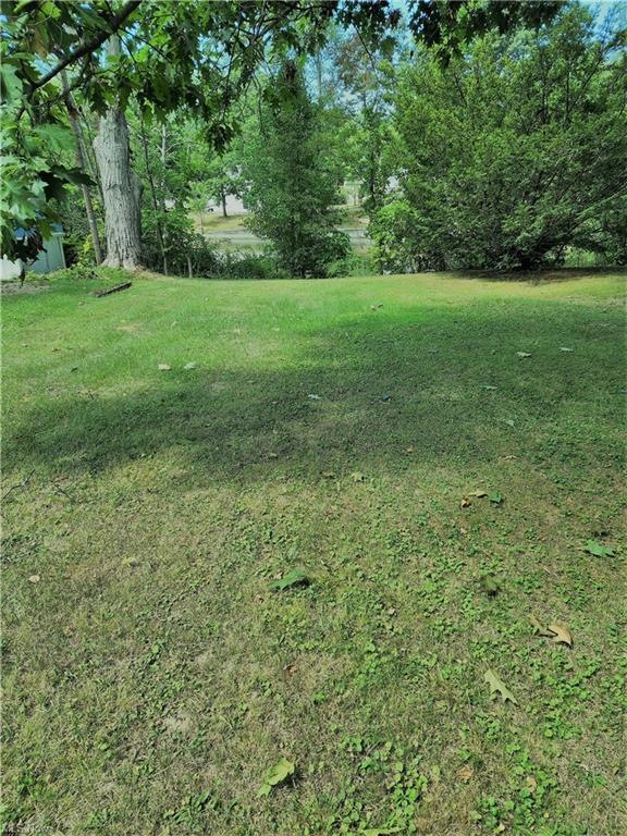 Lot looking toward the lake.  Lake visible