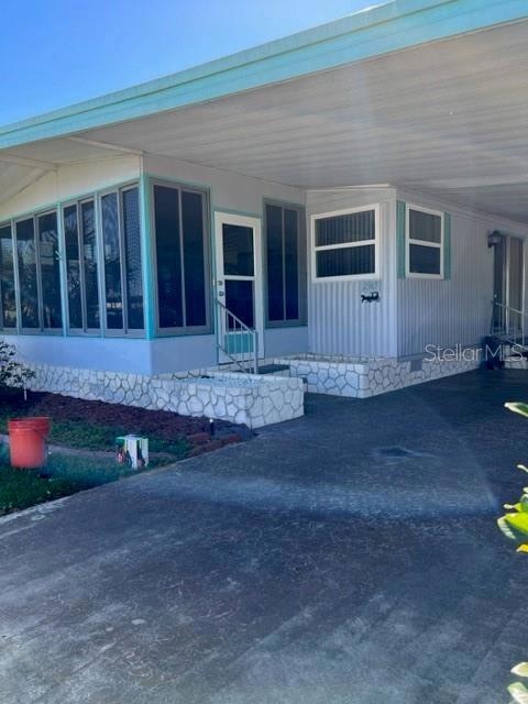 View of Front of Property /Florida Room/Lanai